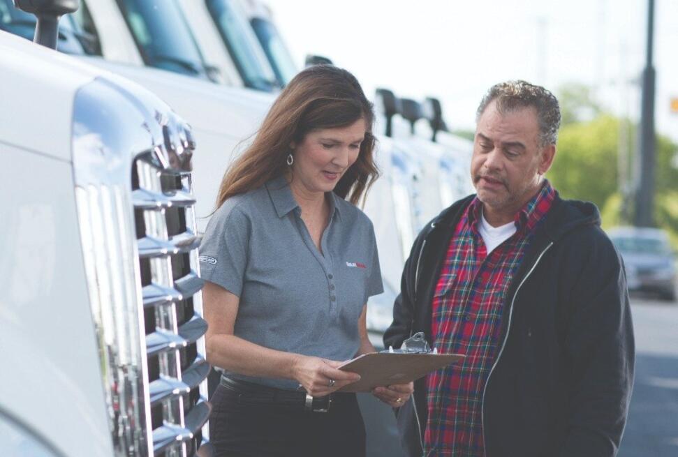 customer looking at financing truck forms